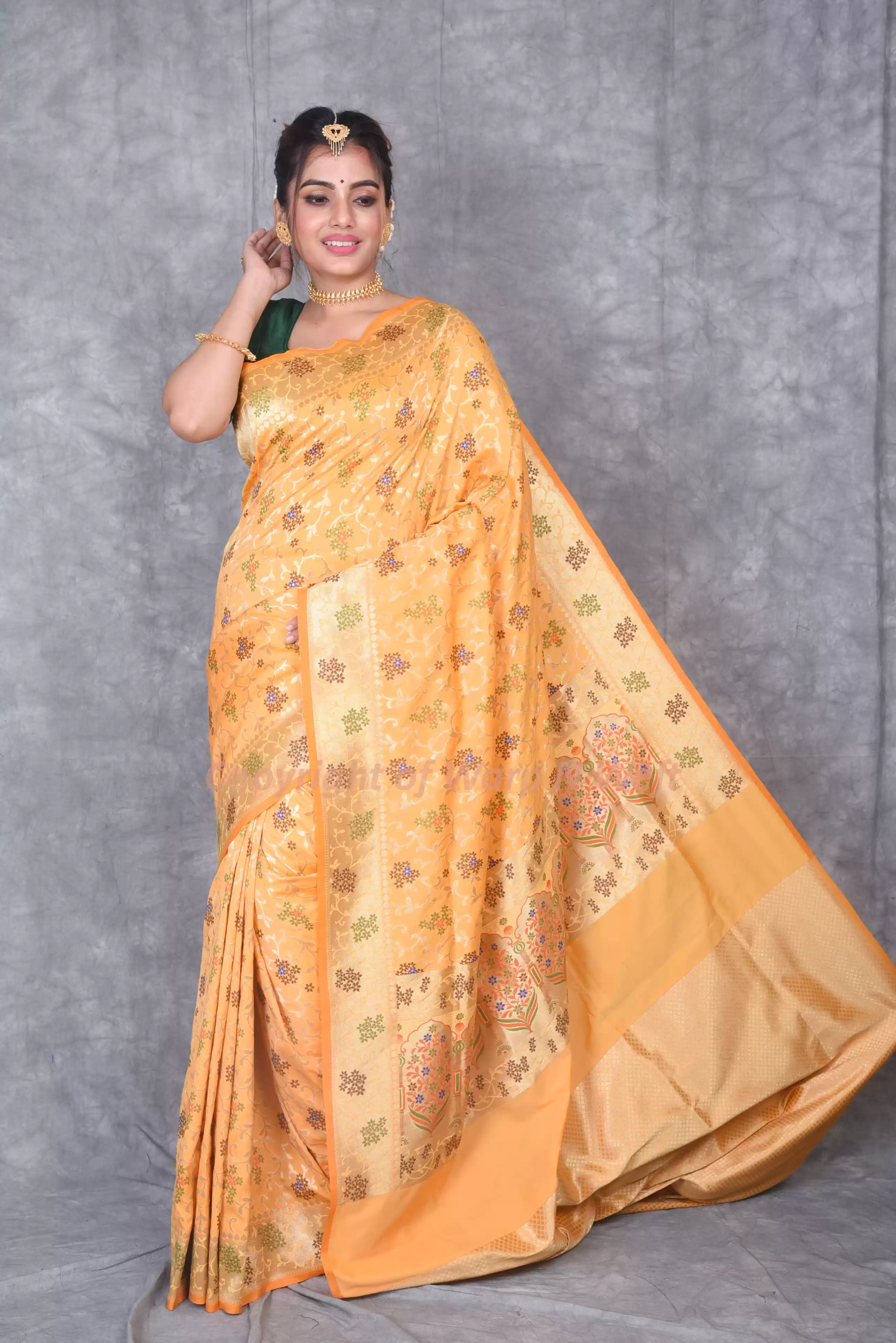 Yellow Woven Banarasi Silk-Style Saree with Floral Motifs & Zari Border