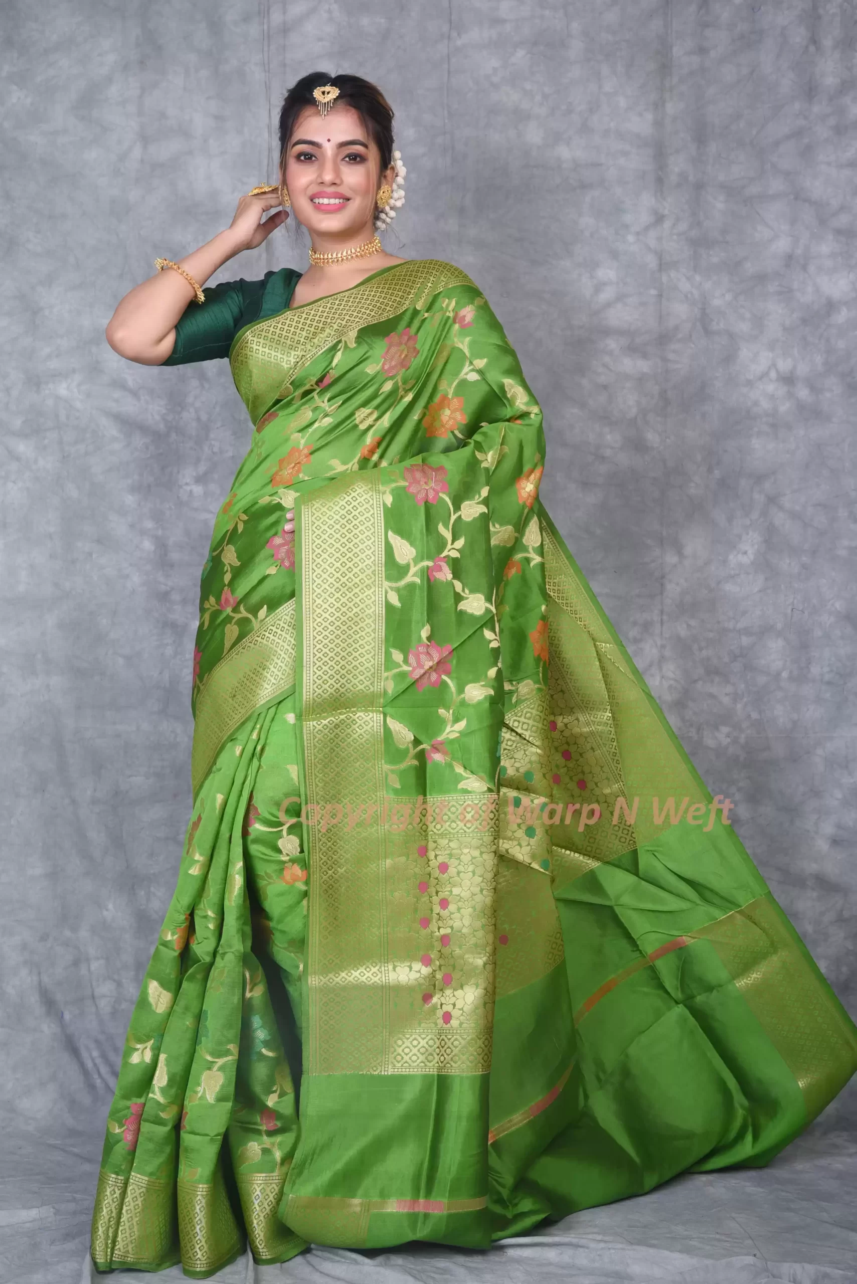 Green Silk Woven Banarasi Saree with Intricate Zari Floral Motifs