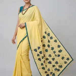 Handcrafted cotton saree with floral patchwork, perfect for elegant and comfortable traditional wear.